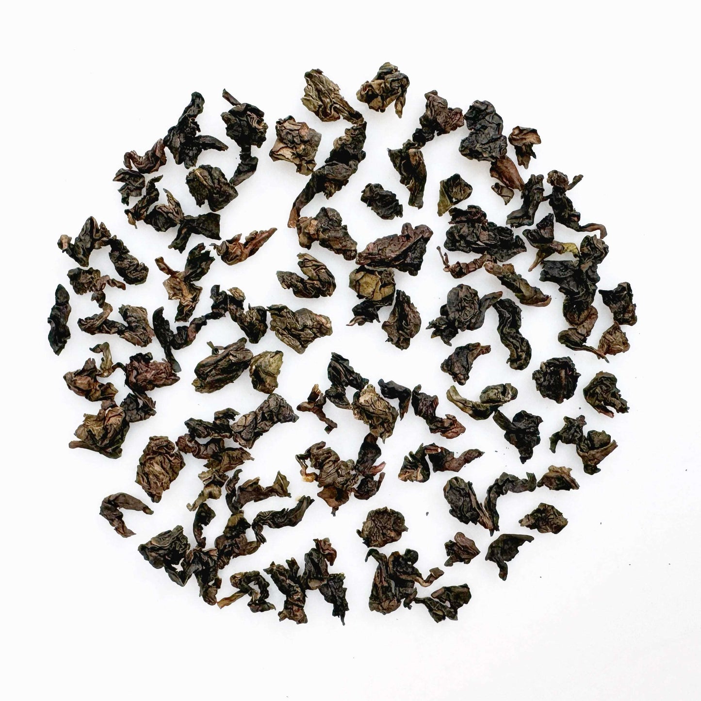 正品觀音茶王茶葉色澤烏潤,捲曲壯實 | Ti Kuan Yin Oolong Tea loose leaves have a dark, glossy appearance and are tightly curled