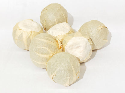 每顆二十年舊普洱柑桔茶皆獨立包裝，確保完整性 | Each 20 year aged pu erh tangerine tea is individually packaged to ensure its integrity.
